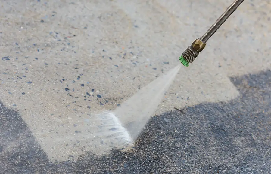 close up view of pressure washing concrete - Fairview Heights, IL