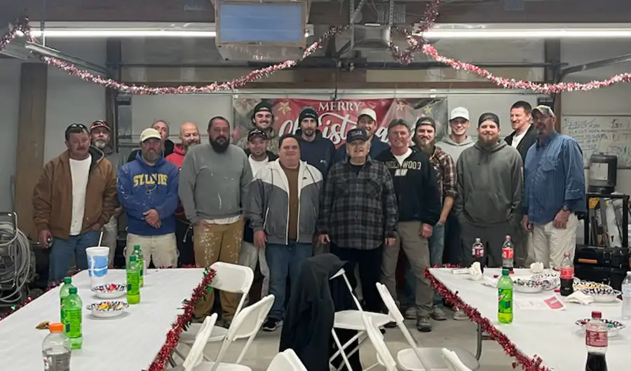 Tyler Painting and Drywall Co. team posing at Christmas Time - O'Fallon, IL